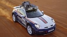 Porsche, la zampata della 911: la Carrera fa rivivere la leggendaria Dakar